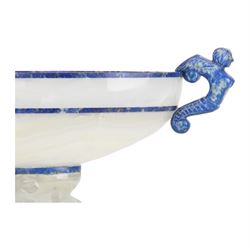 Lapis lazuli and agate twin handled pedestal bowl of navette form, the handles carved as harpies, upon a pierced oval pedestal, 19cm