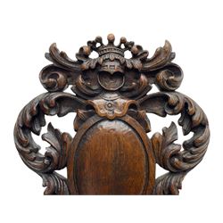 19th century oak hall chair, shaped and pierced back carved with crown cresting over curled and scrolled acanthus leaves, tapered rectangular seat with foliate carved corners and fluted chamfered edge, on turned and lobe carved splayed supports 