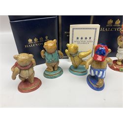 Eight Halcyon Days Teddy Bear of the Year figures, from 1993 to 2000, including one example modelled as a bear in Greek dress carrying a torch, one example modelled as a schoolboy and one example in a blue dress, all boxed 