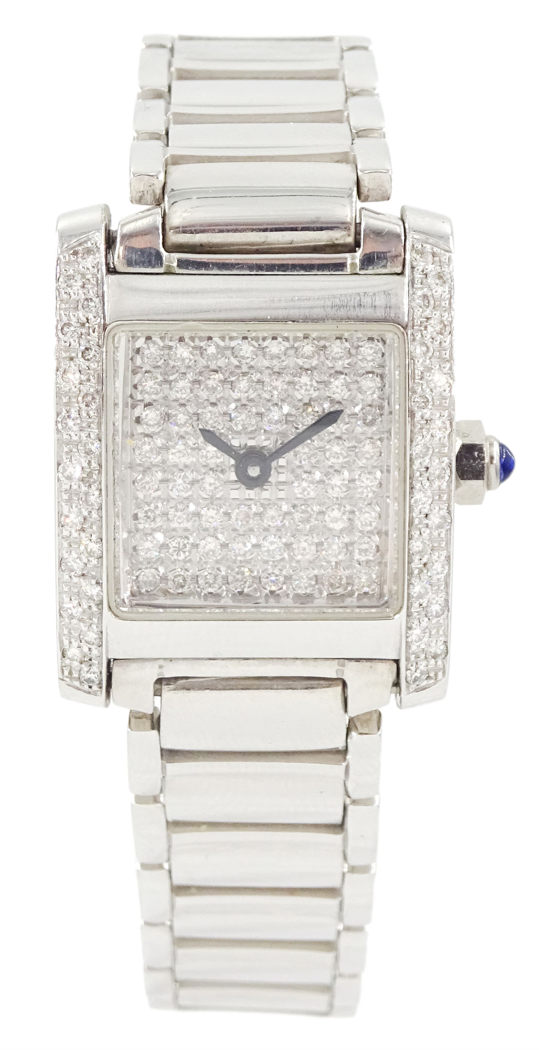 Tresor Paris ladies 9ct white gold diamond quartz wristwatch, pave set round brilliant cut diamond dial and diamond set case, London 2003, on integral 9ct white gold bracelet, with fold-over clasp, stamped 375