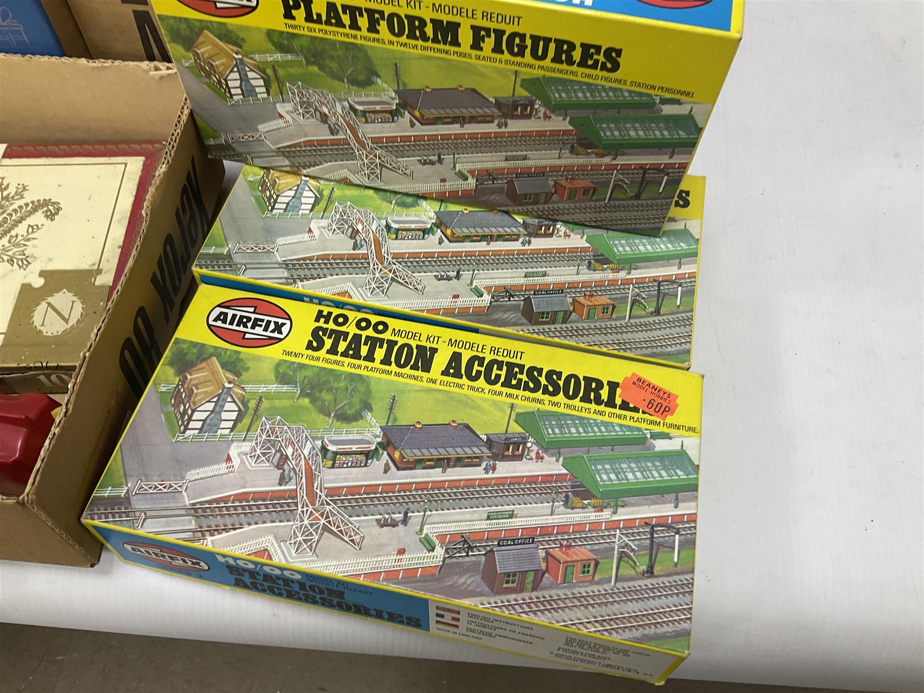 HO/OO gauge - parts and accessories for OO gauge to include power supply units, Airfix trackside accessories kits, miscellaneous parts for building model trains etc, in two boxes 