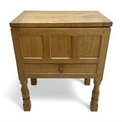 Mouseman - oak work or sewing box, rectangular adzed top inscribed 'L. M. C. 1976' enclosing vacant interior, triple panelled front and double panelled sides, fitted with single drawer, on octagonal supports, carved with mouse signature, by the workshop of Robert Thompson, Kilburn 