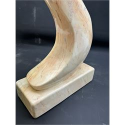 Abstract marble sculpture modelled as a mother and child on a rectangular base, H62cm