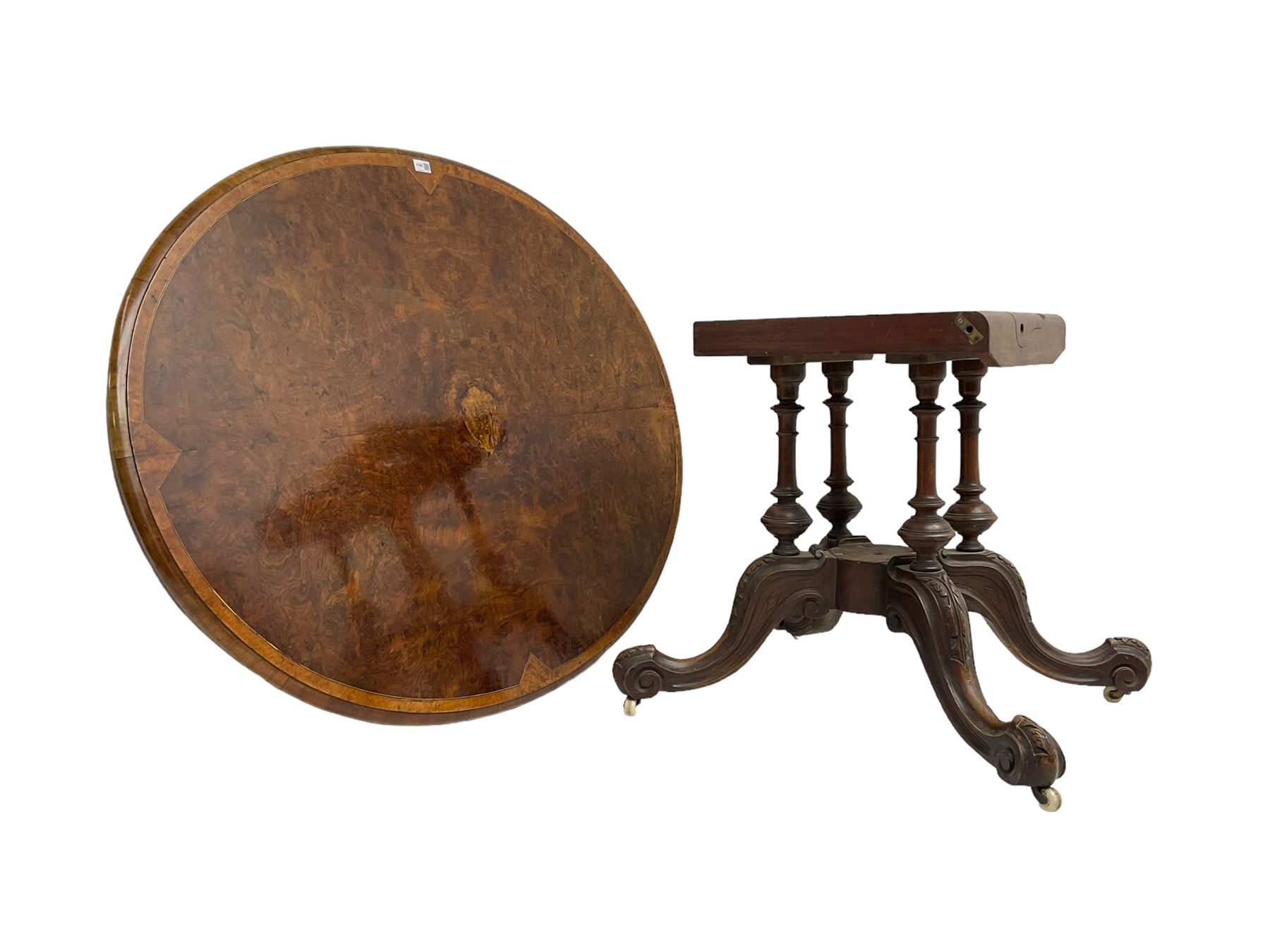 Victorian figured walnut loo table, oval moulded top with quarter matched veneers, on quadruple turned pillar base, acanthus carved splayed supports with scrolled terminals