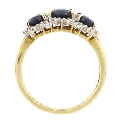 9ct gold three stone oval cut sapphire and round brilliant cut diamond cluster ring, hallmarked