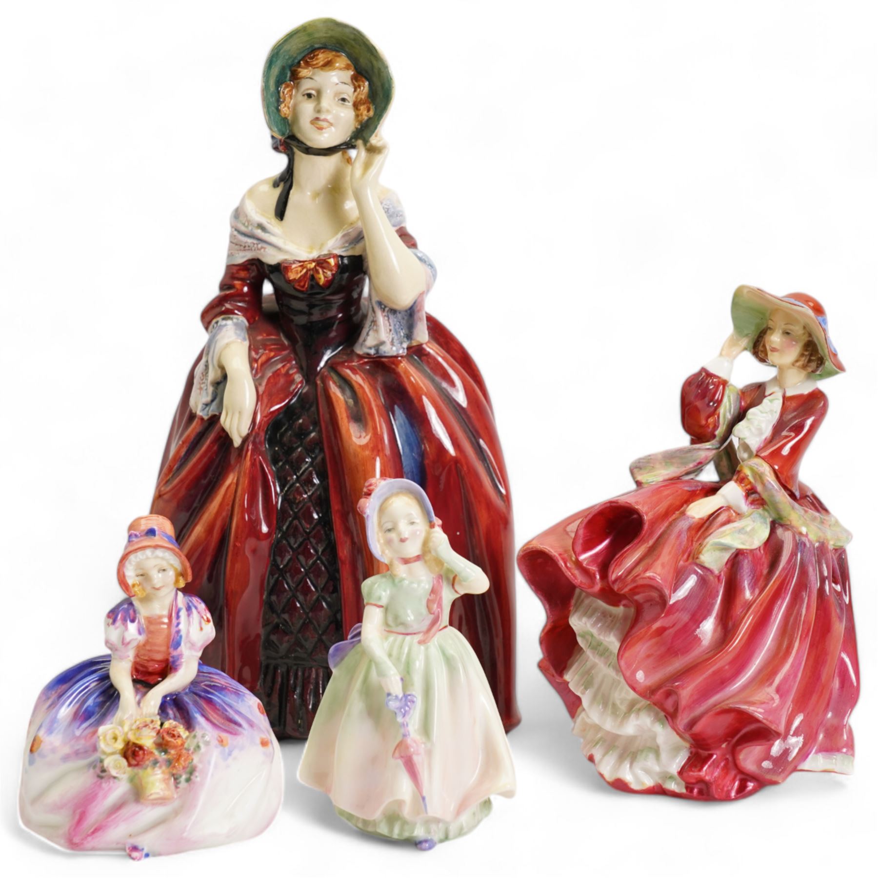 Four Royal Doulton figures comprising Margery HN1413, H27.5cm, Top o' the Hill HN1843, Babie HN1679 and Monica, Potted By Doulton HN1467 (4)