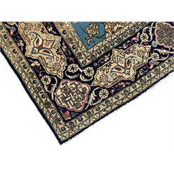 Persian Nain blue ground rug, overall arabesque design, the busy field decorated with interlacing branches and palmettes, indigo ground border with panels decorated with knots and lotus flower motifs, surrounded by trailing branches and flower heads, within guard stripes