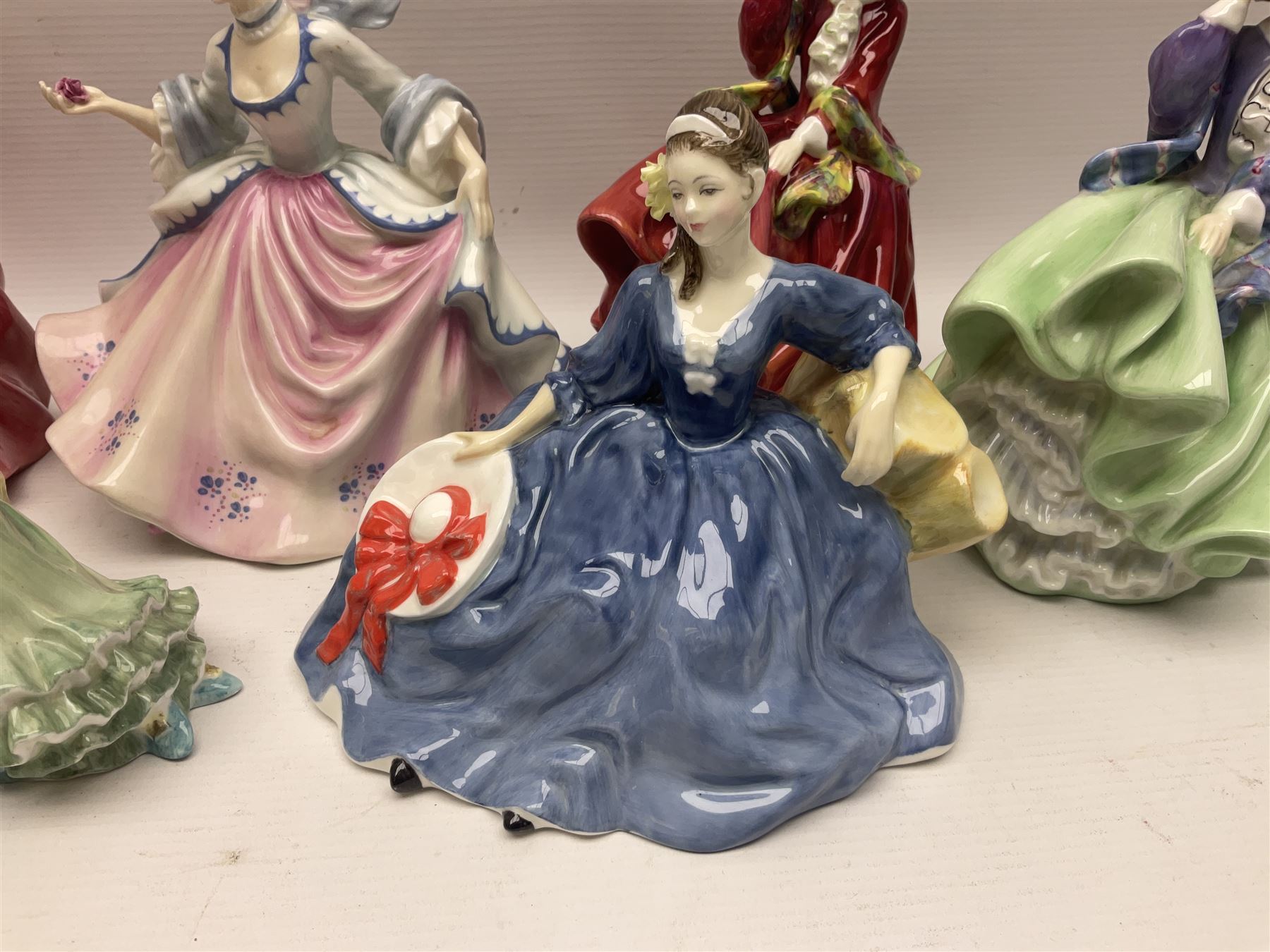 Eight Royal Doulton figures, including Ascot HN2356, Rebecca HN2805, Top o the Hill HN1833 etc