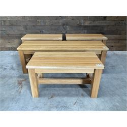 Three small light oak benches and a large bench