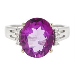 9ct white gold oval cut pink / purple stone possibly topaz and round brilliant cut diamond...