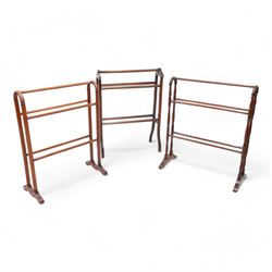 Three Victorian walnut towel rails - one with shaped and pierced cresting rails with square supports and splayed feet, united by chamfered rails (H90cm), two turned examples (3)