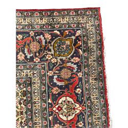 Perisian Bidjar crimson ground rug, within scalloped borders, central pole medallion, the field decorated all over with floral Herati motifs, guarded border decorated with repeating stylised plant motifs and trailing branch 