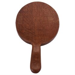 Mouseman - tooled oak cheeseboard, oval form with projecting handle carved with mouse signature, by the workshop of Robert Thompson