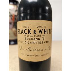 Novelty musical cigarette dispenser, in the form of a Black & White whisky bottle, H28cm