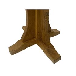 Mouseman - oak occasional table, octagonal adzed top, cruciform pedestal on sledge feet, carved with mouse signature, by the workshop of Robert Thompson, Kilburn 