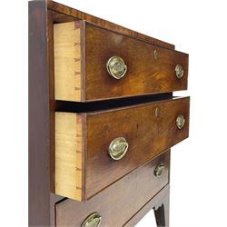 George III mahogany chest, rectangular ebony strung top, fitted with three graduating cock-beaded drawers with oval pressed brass handle plates and demi-lune handles, on tall bracket feet 