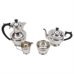 1930s silver four piece tea service, comprising teapot, hot water pot, sugar bowl and milk...