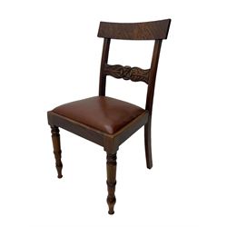 Set of six (4+2) early 19th century mahogany dining chairs, figured bar back over rose and curled leaf carved middle rail, drop-in seats upholstered in brown fabric, on turned front supports 