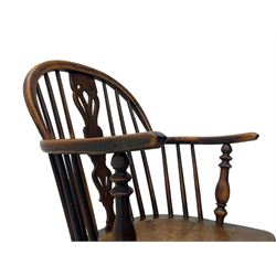 19th century yew wood and elm Windsor armchair, low double hoop stick and pierced splat back, dished seat on turned supports united by crinoline stretchers