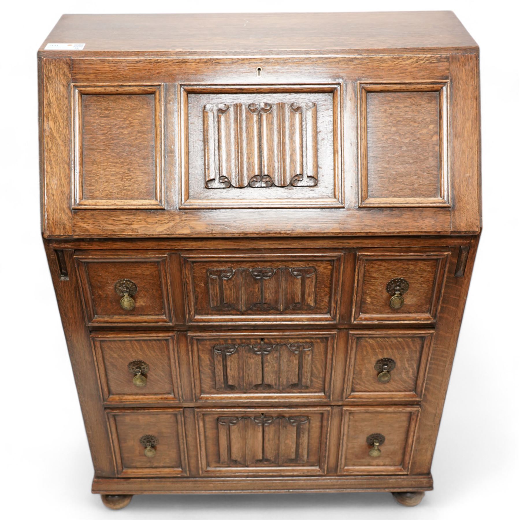 Mid-20th century oak bureau, fitted with fall front above three drawers