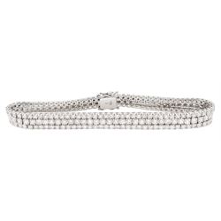 18ct white gold three row round brilliant cut diamond bracelet, stamped, total diamond weight approx 7.70 carat