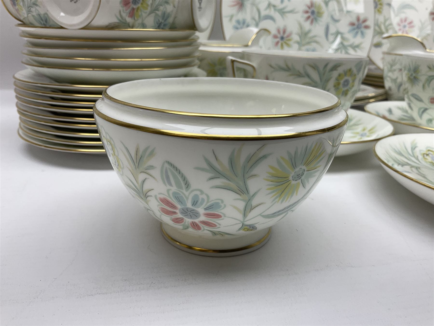 Minton Vanessa pattern part tea service, to include fifteen cups and saucers, open sucrier, milk jug, eighteen dessert plates, twelve side plates etc (70)