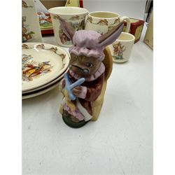 Royal Doulton Bunnykins teawares, including teacups and saucers, egg cup, money boxes etc (12)