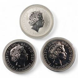 Three Queen Elizabeth II one ounce fine silver Britannia coins, dated 1998, 2008, 2009 and a Johnson Matthey Bankers Limited one-hundred grams fine silver bullion bar, cased 