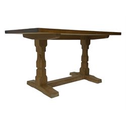 Mouseman - oak dining table, rectangular adzed top with rounded corners, octagonal pillar supports on sledge feet united by floor stretcher, carved with mouse signature, by the workshop of Robert Thompson, Kilburn