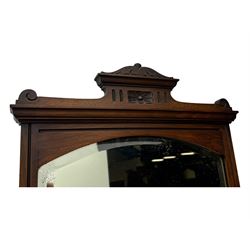 Late Victorian walnut dressing table, raised bevelled swing mirror over small trinket drawers, rectangular moulded top, fitted with two drawers, on turned supports united by undertier 