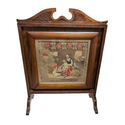 Victorian sampler, depicting woman and young child feeding rabbits, worked by Mary Ann Siswick 1849, set within an oak fire screen, fire screen H75.5cm