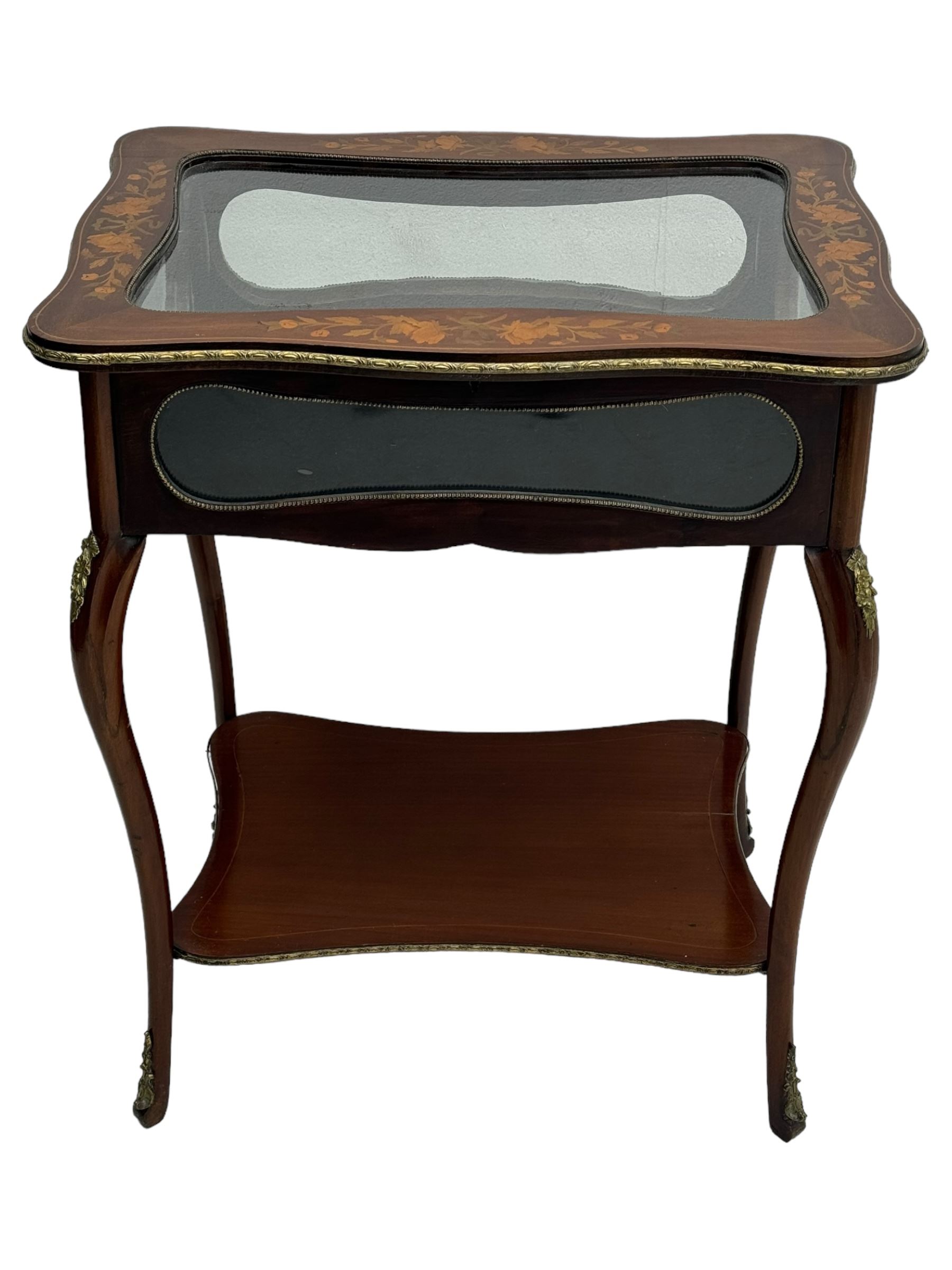 Late 19th century inlaid mahogany bijouterie table, glazed hinged top with floral marquetry, enclosing a felt-lined interior, lower shelf, ormolu mounts on cabriole supports with gilt accents