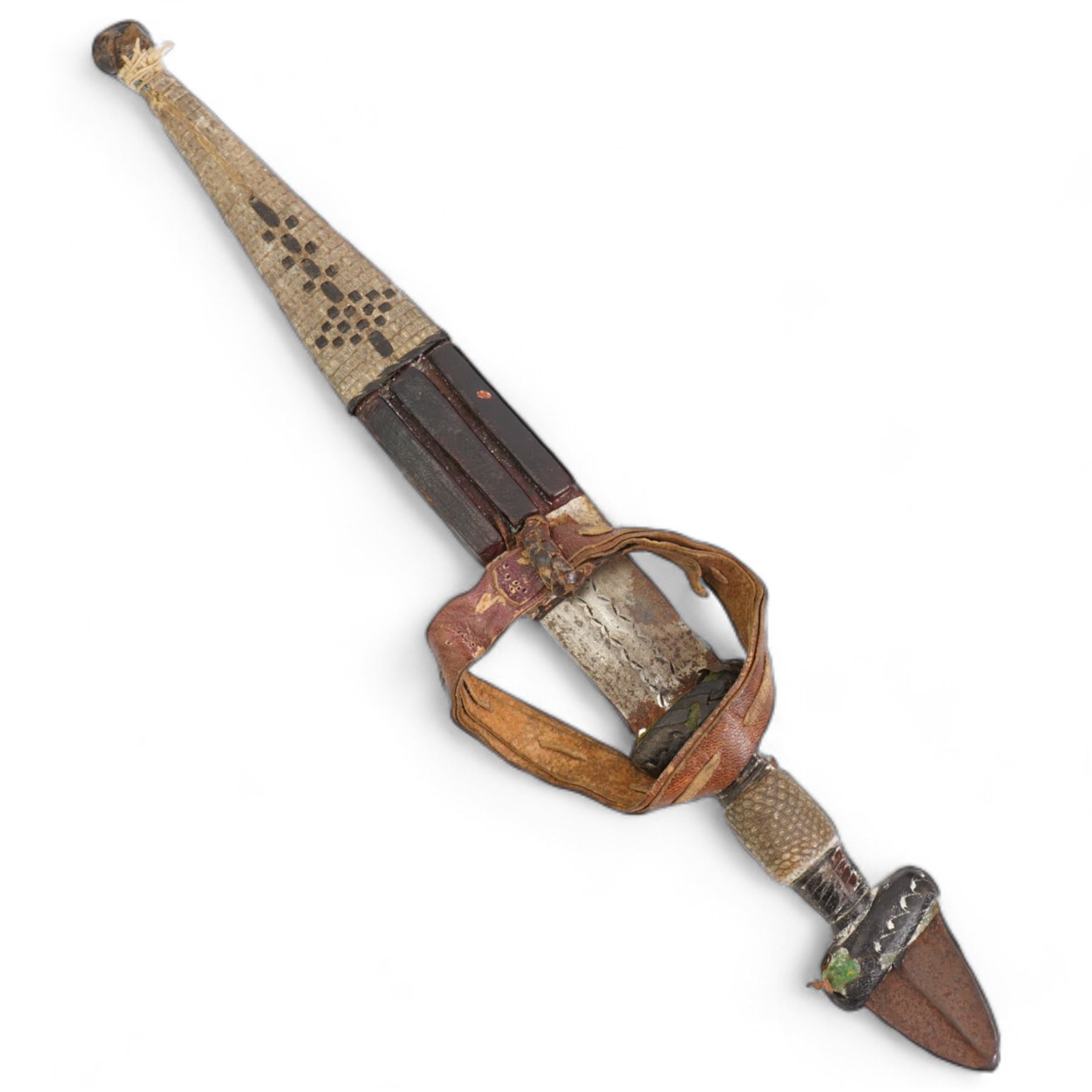 North African arm dagger with leather scabbard, blade length 19cm and a South American hunting knife, the ricasso marked 'Rio Branco', blade length 18cm (2) 