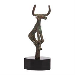 Hattian bronze bull standard, modelled stood upon stand, with long muzzle, raised pellet e...