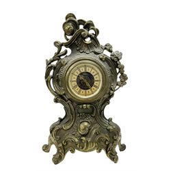 A 20th century brass cased spring driven mantle clock and early 20th century oak cased ane...