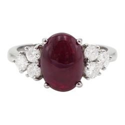 18ct white gold cabochon cut ruby and six stone round brilliant cut diamond ring, hallmarked, ruby approx 3.70 carat, total diamond weight approx 0.55 carat