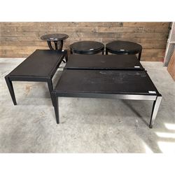 Three rectangular ebonised coffee tables and three circular tables