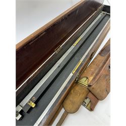 Early 20th century drawing instruments, to include a boxed set of large compasses, possibly for map drawing, marked 5, 6 and 7 miles, in fitted wooden case, together with two rules marked W. Harling and a parallel rule stamped R. E & Co MK II, all with broad arrow mark, contained within leather cases