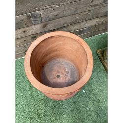 Circular terracotta garden planter, decorated with cherubs and terracotta urn on plinth - THIS LOT IS TO BE COLLECTED BY APPOINTMENT FROM DUGGLEBY STORAGE, GREAT HILL, EASTFIELD, SCARBOROUGH, YO11 3TX