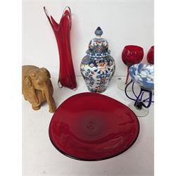 Makkum urn, collection of red art glass including large bowl and a carved wooden elephant, etc