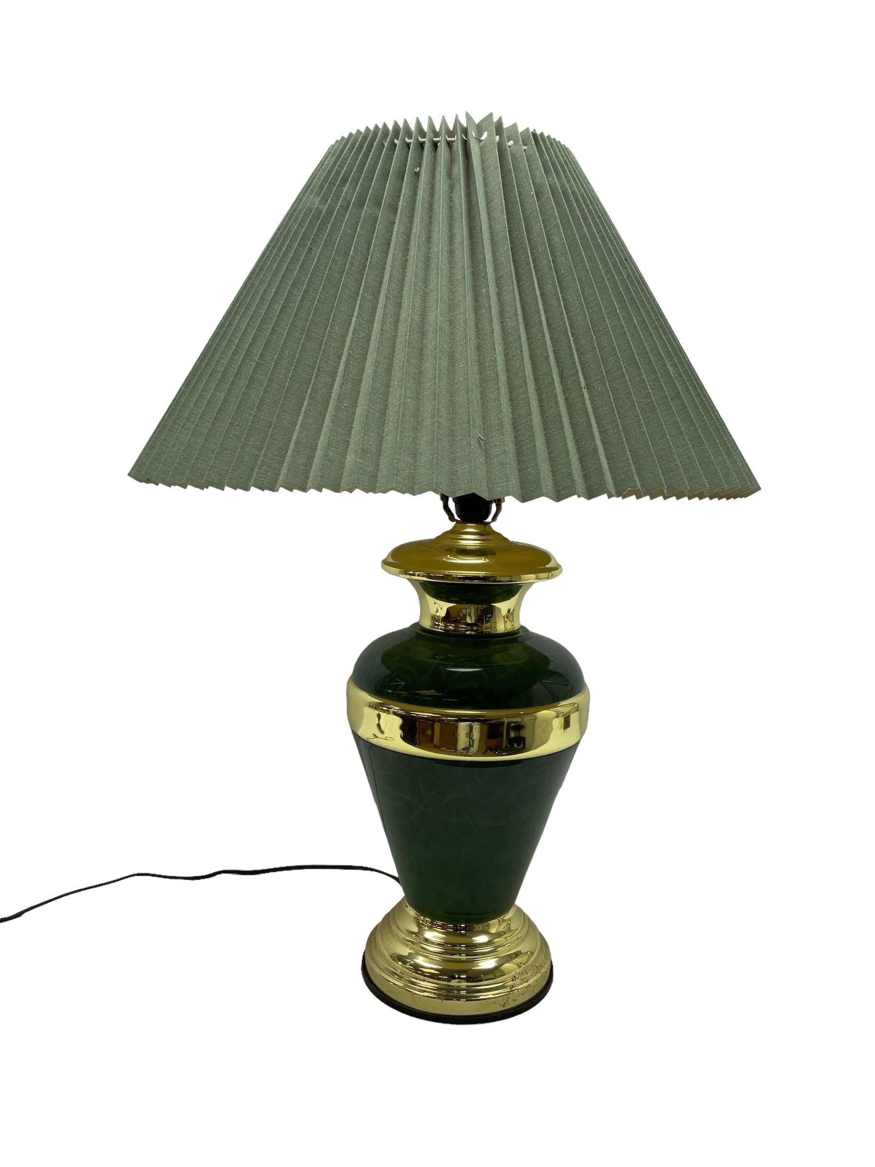 Table lamp of baluster form decorated in mottled green with gilt mounts and banding, with pleated green shade, approx H72cm incl shade