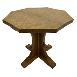 Mouseman - occasional table, adzed octagonal top, cruciform base on sledge feet, carved with mouse signature, by the workshop of Robert Thompson, Kilburn 