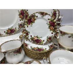 Royal Albert Old Country Roses pattern part tea and dinner service, to include two tureens, eight dinner plates, six side plates, twelve bowls, two mugs, seven teacups and saucers, milk jug,  twelve cake plates, six soup bowls and saucers, candlesticks, etc (95)