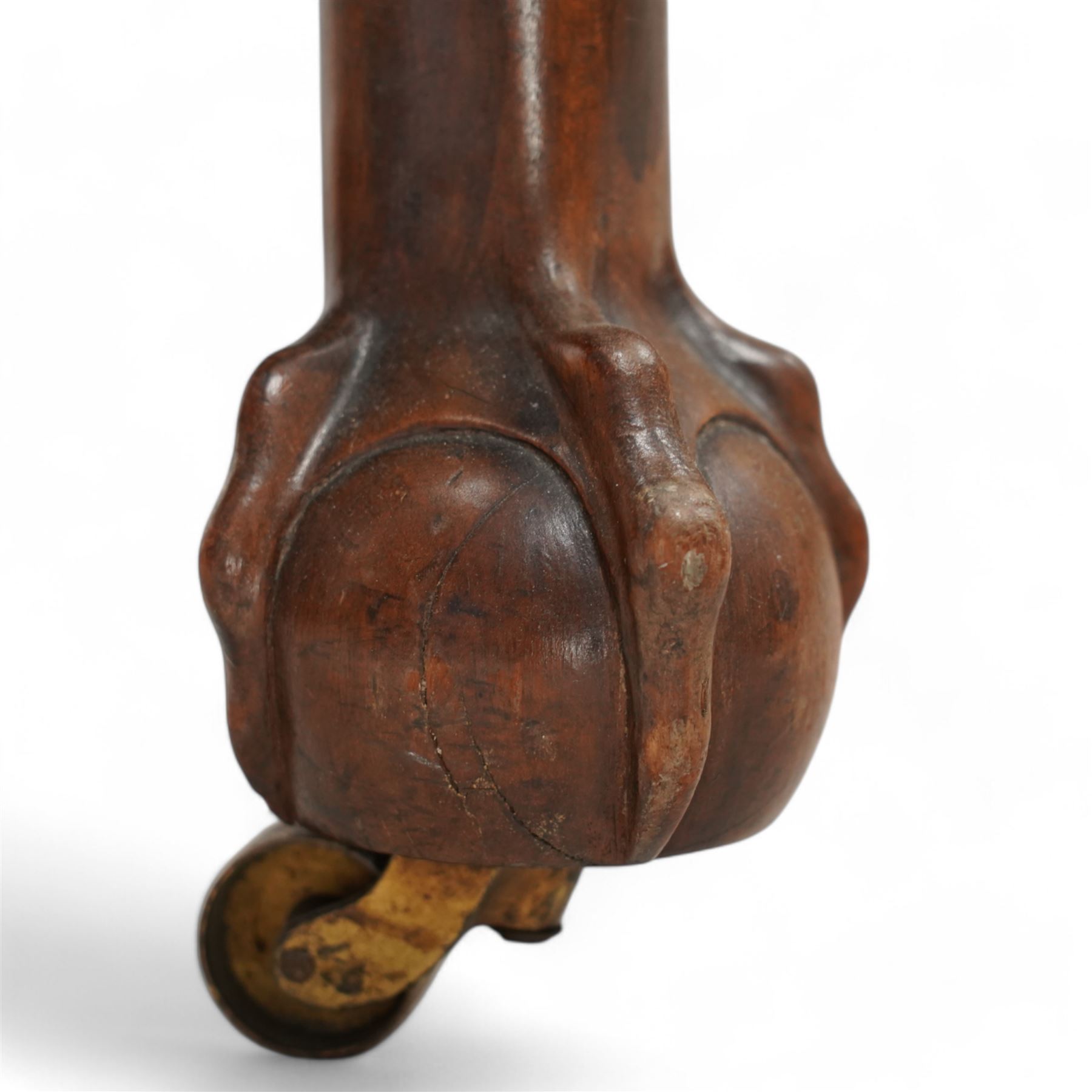 Early 20th century telescopic extending dining table, gardroon carved rectangular top with rounded ends, scrolled acanthus leaf carved cabriole supports with ball and claw feet, on brass castors, with two additional leaves  