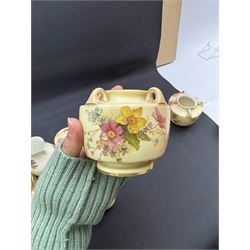 Collection of Royal Worcester blush ivory ceramics, including a graduating set of posey baskets, miniature flatback jug, covered jars etc (19) 