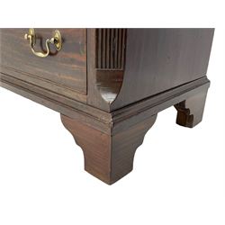 Small George III mahogany chest, rectangular canted form, moulded top over two short and three long cock-beaded drawers, fitted with brass swan neck handles and oval plates, enclosed by fluted upright corners, on bracket feet 