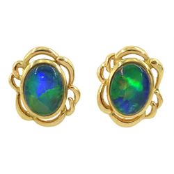 Pair of 18ct gold opal triple stud earrings, stamped