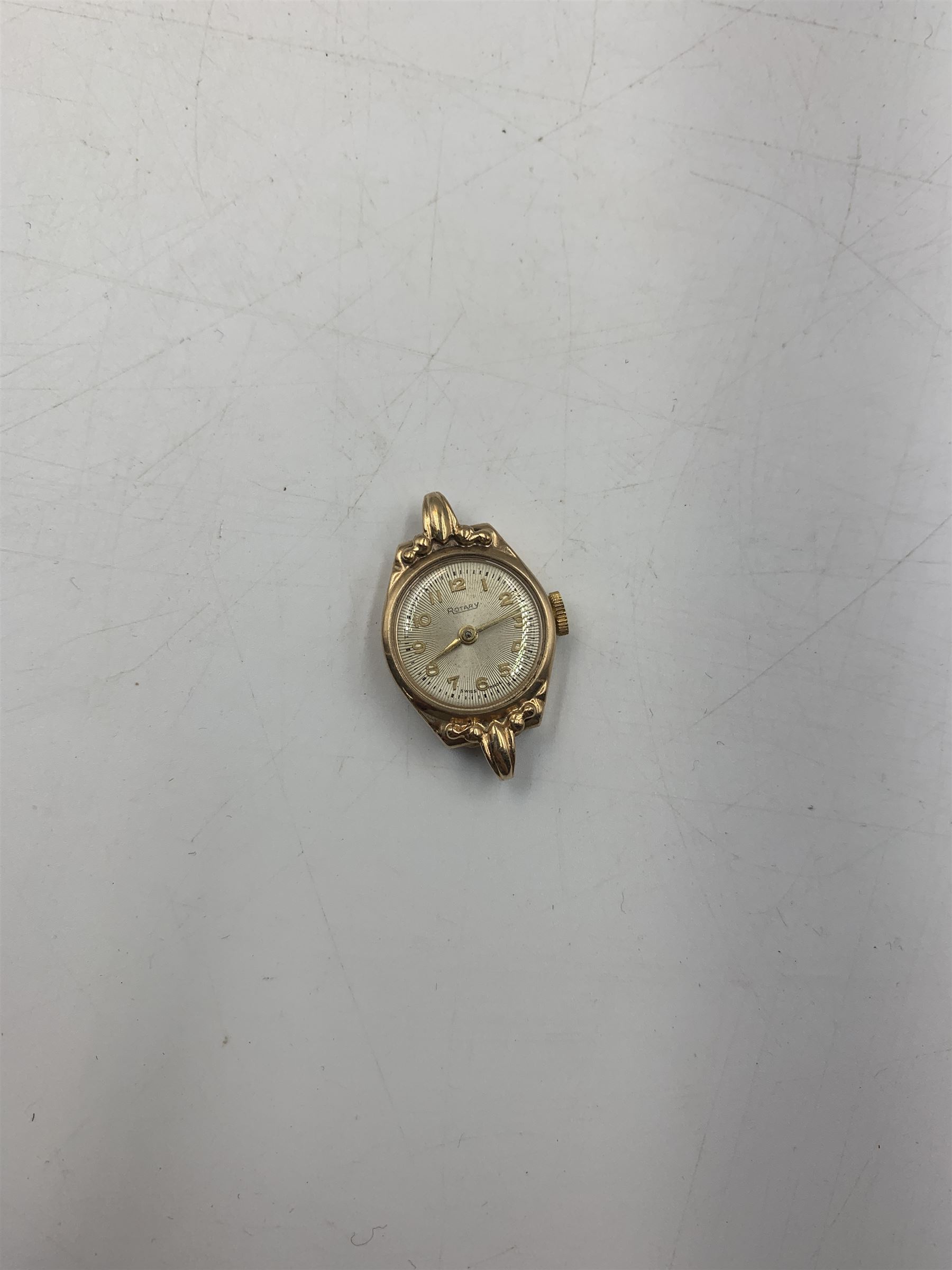 Early 20th century keyless fob watch, white enamelled dial with Roman numerals and subsidiary seconds dial, outer case stamped 14K, 9ct gold cased Rite-Tyme mechanical wristwatch, on a gilt stainless steel bracelet, a ladies 9ct gold cased mechanical movement wristwatch, with blue enameled case, on a rolled gold bracelet strap, ladies 9ct gold mechanical movement wristwatch on an expanding bracelet strap stamped 9ct and another 9ct gold cased mechanical movement wristwatch, together ladies Rotary 9ct gold cased mechanical wristwatch and ladies Bulova rolled gold mechanical wristwatch (lacking straps)