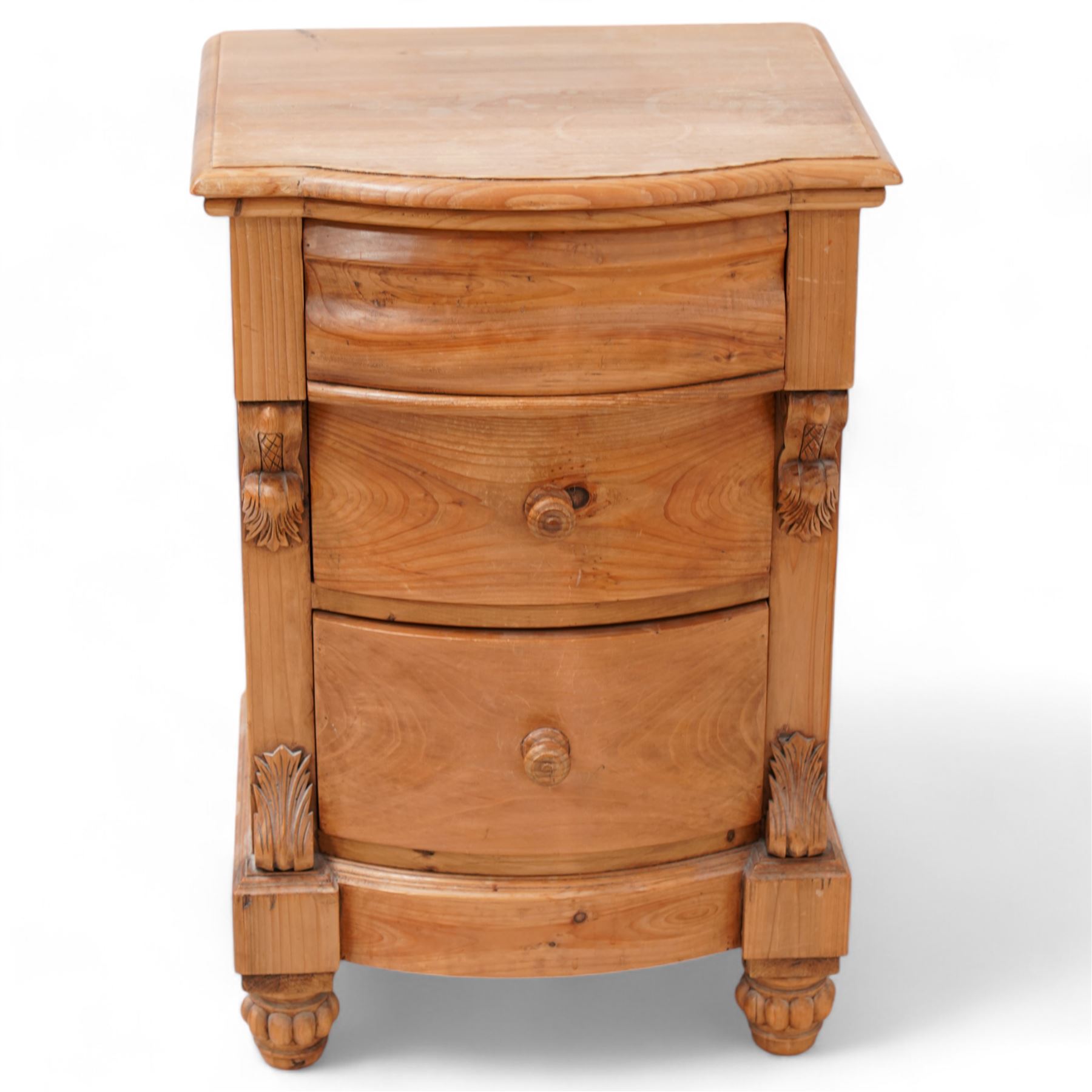 Keenpine - Victorian design bow-front pine bedside chest, cushion drawer over two graduating drawers flanked by scrolling acanthus uprights, on lobed feet