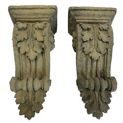 Pair of Victorian design cast stone architectural corbel wall brackets, stepped rectangular top over a scrolled bracket with relief acanthus leaf decoration and rosette motifs to the side